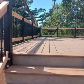 Spacious elevated backyard deck with seating arrangement