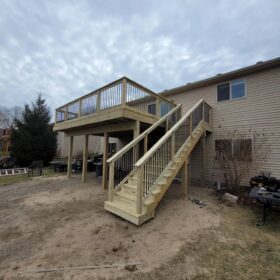 Wooden deck on hillside with panoramic views